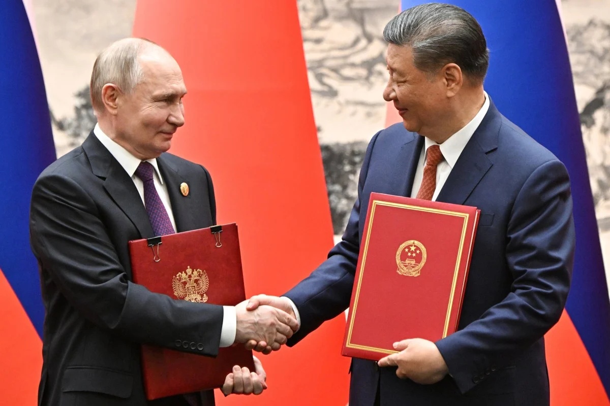 Xi Jinping and Vladimir Putin pledge to develop even closer China-Russia ties in energy and finance.jpg